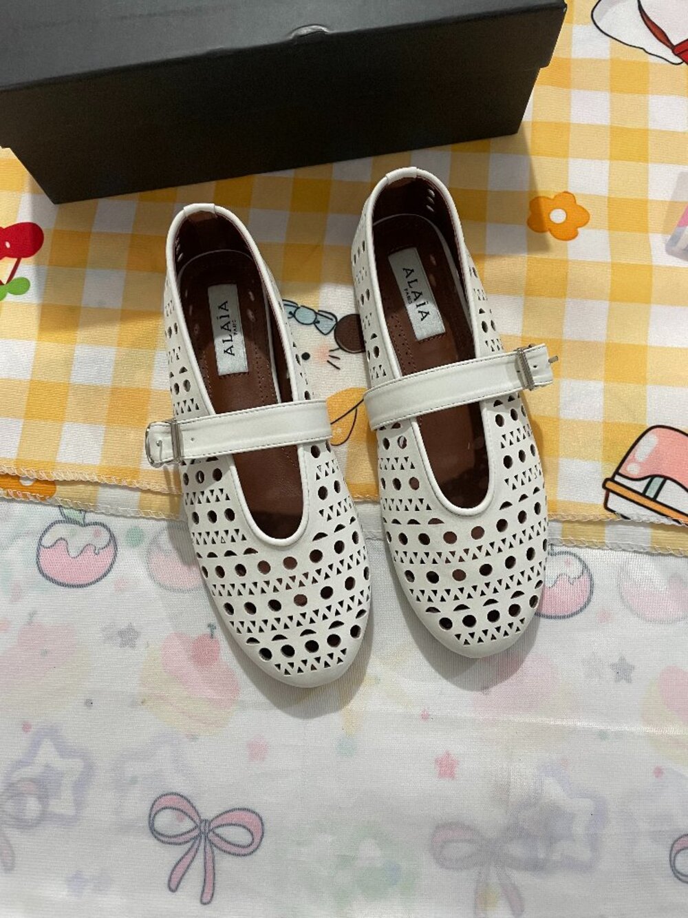 ALAÏA White Cut-Out Mary Jane Ballet Flats